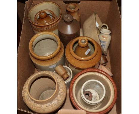 ~ A collection of 19th century and later stoneware jars; a jelly mould; a twin handled circular planter labelled Buchanan &am