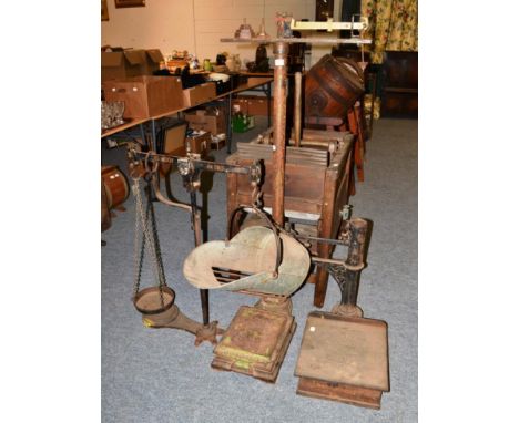 ~ W &amp; T Avery, a set of early 20th century balance scales; a smaller set of cast iron bench top scales; and SCWS Limited,