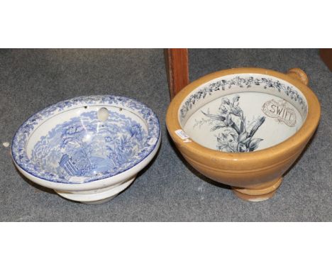 ~ A 19th century blue and white transfer printed ceramic cistern and later 19th century stoneware; and blue and white floral 