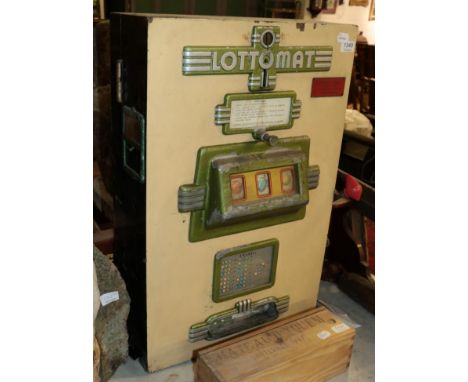 ~ A Lottomat penny slot machine with painted wooden case, 70.5cm high