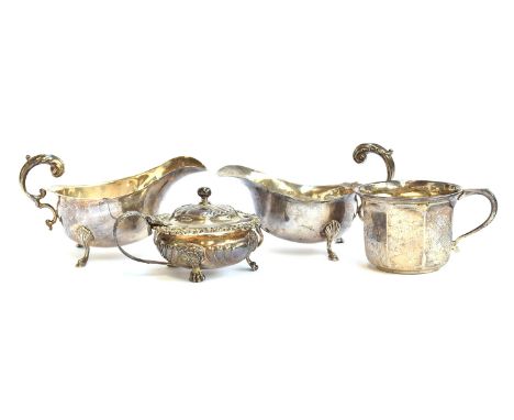 A George III chased lidded mustard, maker's mark RP, London 1818; together with a pair of early 20th century sauce boats, and