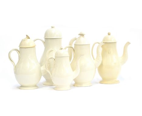 A collection of five 18th century and later creamware coffee pots: the tallest with domed cover and simple knop finial, stamp