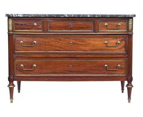 A Louis XVI mahogany commode, late 18th century, the marble top over three short and two long drawers, flanked by gilt metal 