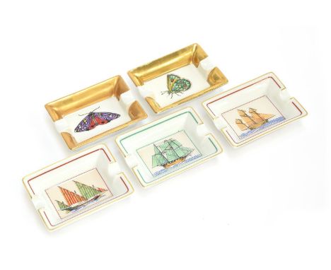 A set of three Hermes Paris small porcelain ashtrays depicting sailboats, 7.9cm wide, together with two further porcelain ash