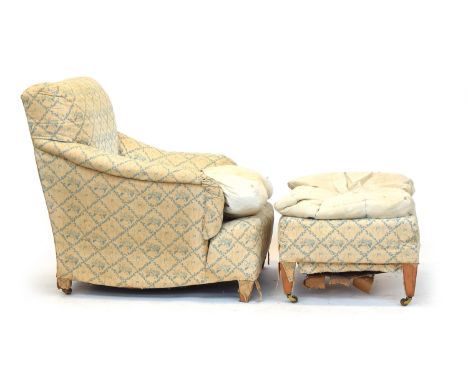 A good country house armchair and footstool in the manner of Howard & Sons, with loose feather filled cushion, and loose cove