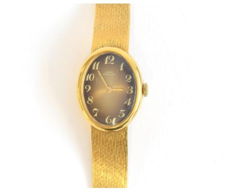 A ladies vintage 18ct gold Girard Perregaux watch, champagne coloured dial with Arabic numerals, the case 21mm wide, stamped 