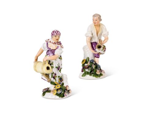 A pair of mid 18th century Meissen figures of a gardener and companion, both modelled with a watering can on a flower-encrust