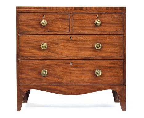 A George III mahogany chest of drawers, the caddy moulded  boxwood strung top over two short and two long drawers on bracket 