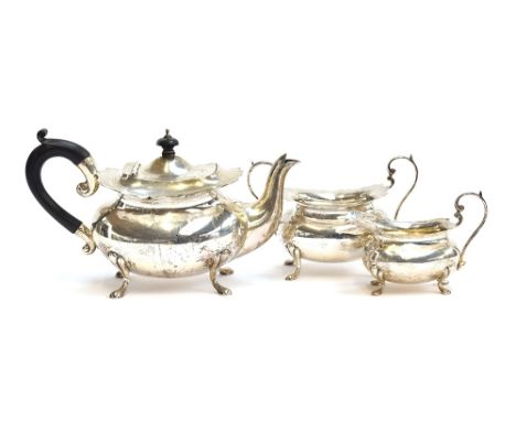 A three piece silver tea set by Walker &amp; Hall, Sheffield 1911, 28.7ozt