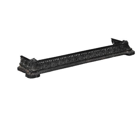 A George III steel fender, c.1800, with pierced frieze and paterae, 119cm wide, 41cm deep; together with a Victorian black pa