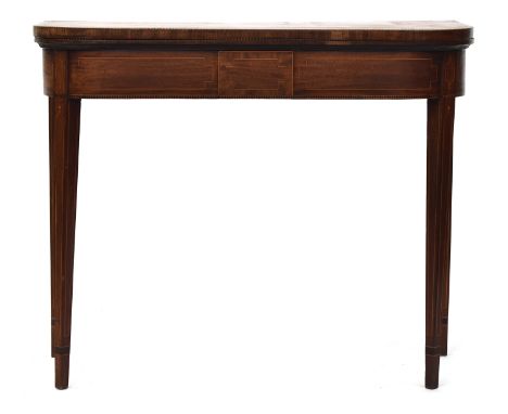 A George III mahogany card table, the foldover top with barber's pole stringing, opening to a green baize interior, on square