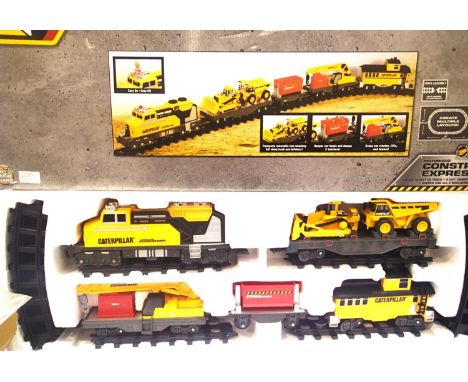 Battery operated Construction Express train set; CAT. approximately O gauge. P&amp;P Group 2 (£18+VAT for the first lot and £