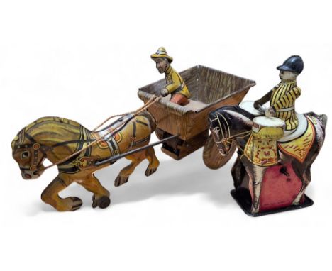 A Louis Marx horse drawn cart and coachman c.1950s; a Wells Brimtoy, tinplate clockwork horse mounted drummer