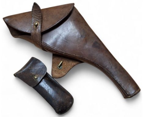 A WWI Military pattern British Army Officers leather&nbsp;.455 service revolver holster; a WWI leather belt penknife/wire cut