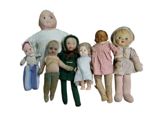 A Chad Valley cloth doll, blue glass eyes, painted features, 31cm high, c.1940;&nbsp; &nbsp;others, cloth faces, various;&nbs