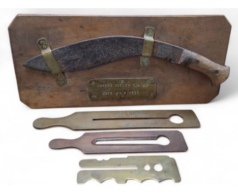 Militaria - a wall plaque with a mounted Kukri above a brass plaque stamped, Gurkha Rifles 9.T.H B.T.N LOOS 25.9.1915, date c