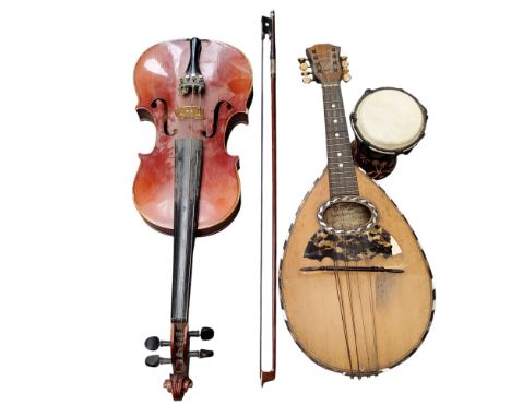 A violin, paper label inscribed Josephus Grienbergern;&nbsp; a&nbsp; I Romito &amp; F Carbone mandolin Strada Concordia 54 Na
