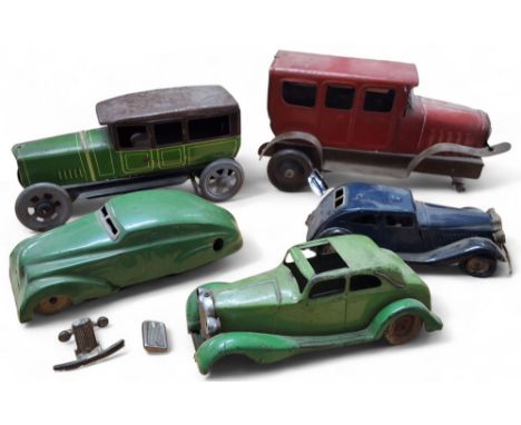 A pre-war German tinplate clockwork veteran car (af); a&nbsp; &nbsp;Wells Brimtoy tinplate 'The Wonder Car', clockwork (af); 