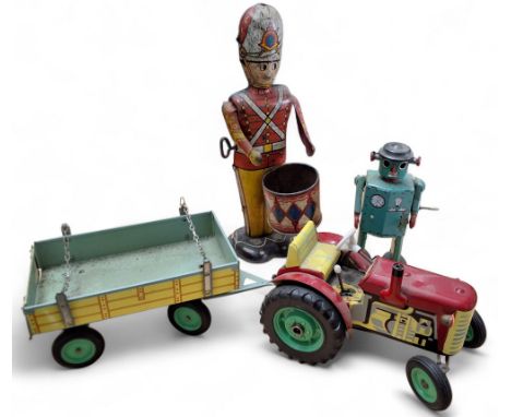 A Czechoslovakian tin plate KOVAP Zetor tractor and trailor, clockwork, three forward gears and reverse, hand brake, steering