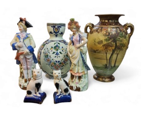 A Staffordshire figure group, Does She Like Butter, of a gentleman and lady with a buttercup, c.1880;&nbsp; &nbsp;others, var