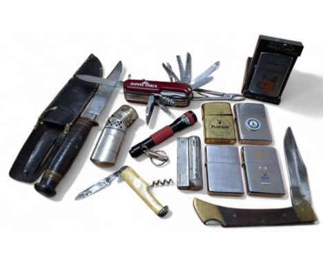 Boxes and objects - a Zippo, brushed chrome and enamel, The Laughing Fox text and a Fox head, 1985; another loose, Royal HMS 