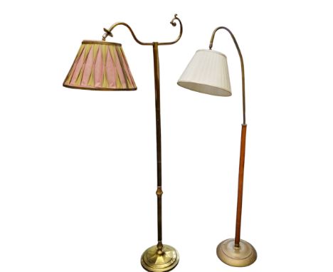 A brass floor lamp, 1245cm high;&nbsp; another, brass and leather (2)