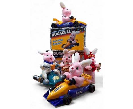 Advertising a - Duracell Racing Bunny, boxed; another loose; a Duracell Ultra Space Scooter Bunny, boxed; a Duracell Drummer 