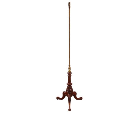 A gilt brass and turned walnut standard lamp - converted from a pole screen in the mid-20th century, the brass column with qu