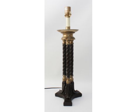 A bronzed and parcel-gilt triple-column lamp&nbsp;in the Regency style&nbsp;- modern, the dished top on three barleytwist col