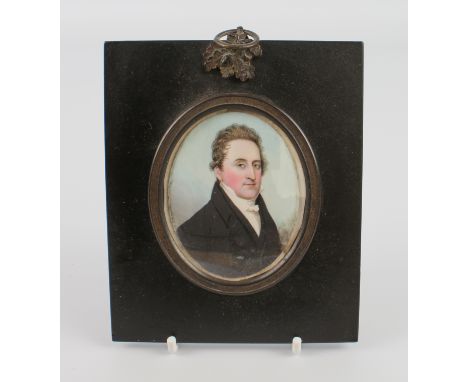 Frederick Buck (Irish, 1771-1840): a watercolour on ivory portrait miniature of a gentleman - oval, 7 x 5.5 cm, frame 13 x 10