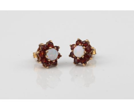 A pair of 9ct yellow gold, opal and garnet cluster earrings - Birmingham hallmarked, with post backs for pierced ears, 10mm d