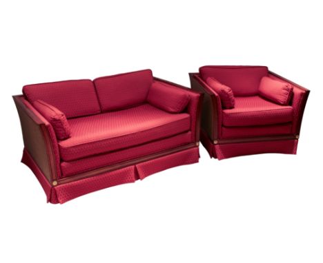 A Harrods mahogany bergere style showframe settee and matching armchair - the flared, angular frames with caned sides and gil