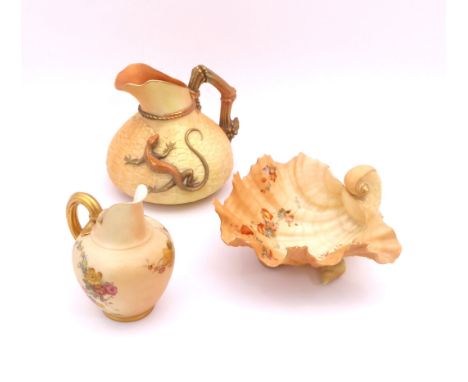 Three pieces of Royal Worcester blush ivory porcelain - comprising a shape 1714 jug with basket weave and lizard decoration, 