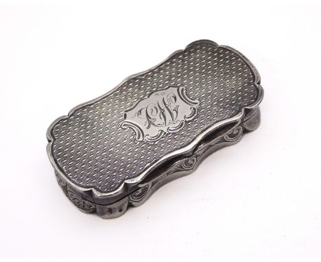 A Victorian silver vinaigrette - Edward Smith, Birmingham 1865, of shaped, rectangular form with engine turned decoration and