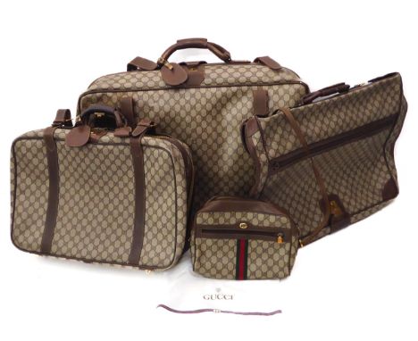 A suite of vintage Gucci Guccissima leather and web monogram canvas luggage - 1980s, comprising a large suitcase, approx. 70 