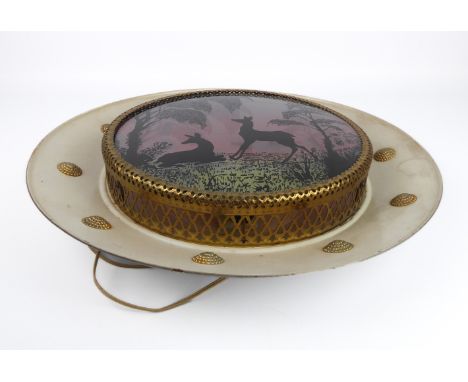 A vintage kitsch 1950s retro light-up wall plaque with deer and sunset landscape - the silhouetted deer and trees reverse pri