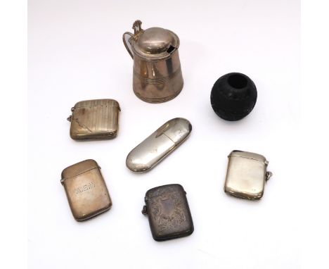 Four silver vesta cases - hallmarked Birmingham 1900, 1909, 1919 and 1925, typical rounded rectangular form, one with chased 