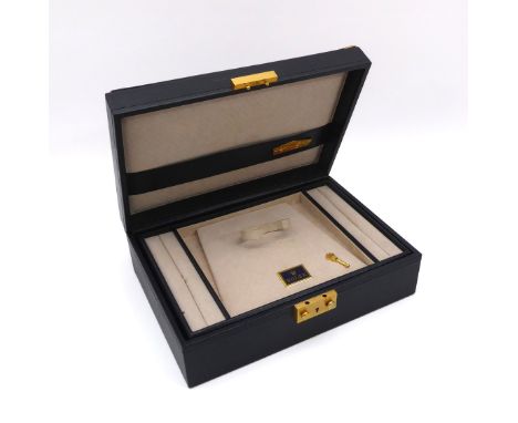 A Rolex leather watch and jewellery box - the very dark green leather box of rectangular form, with brushed gold toned lock a