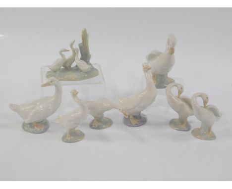 Four Lladro porcelain figures of ducks, three Nao ducks, and a Nao duck group, (8).