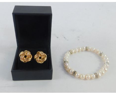 A pair of 9ct gold rope twist earrings, 3.1g, and a cultured pearl and paste banded link bracelet, (2).