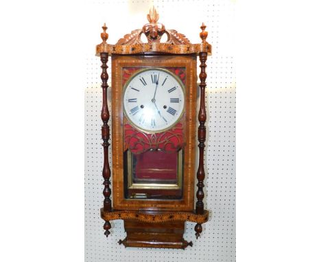 A Victorian walnut and inlaid wall clock, enamel dial bearing Roman numerals, eight day movement with mercury pendulum and be