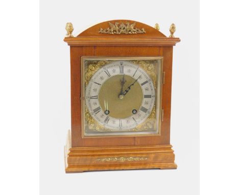 A Lenzkirk walnut cased mantel clock, for Angus of Liverpool, brass square dial with cherub spandrels, silvered chapter ring 