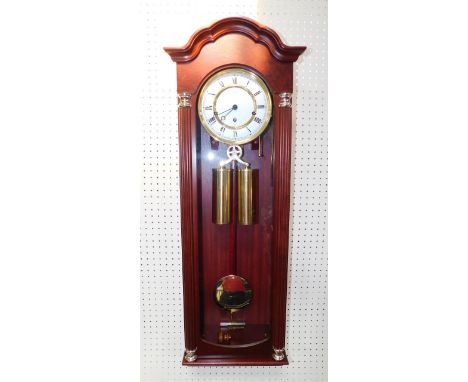 A Hermle mahogany cased regulator wall clock, white enamel dial with Roman numerals, eight day movement with Westminster chim