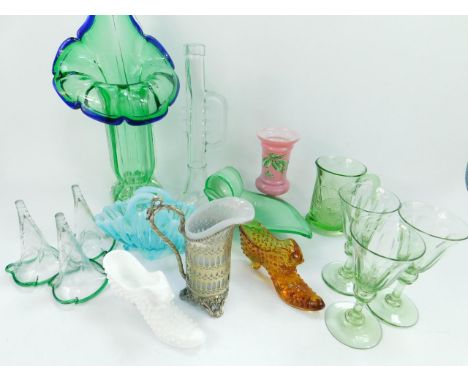 A Victorian green glass Jack in the pulpit vase, opaline glass basket, two glass shoes, three epergne trumpets pink glass vas