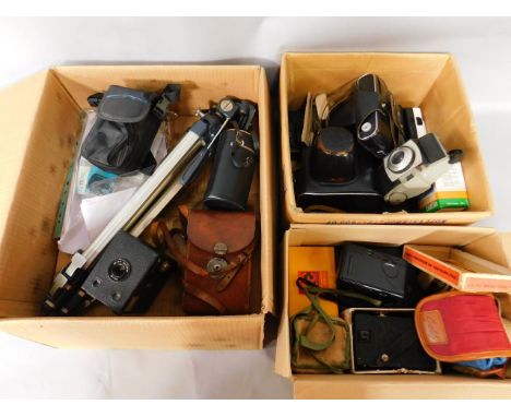 Zenit B and E cameras, Kodak model camera, instamatic cameras, lenses, tripod, and sundries. 