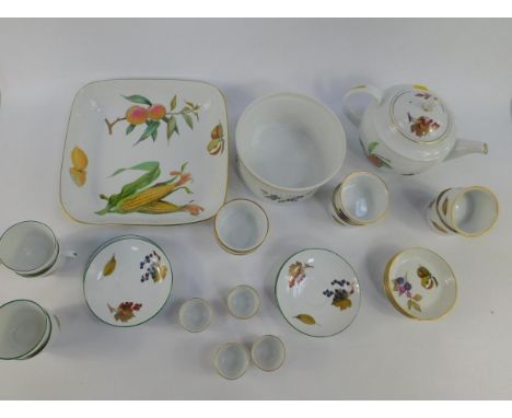 A Royal Worcester square dish decorated in the Evesham pattern, together with a souffle dish, individual souffles and egg cup