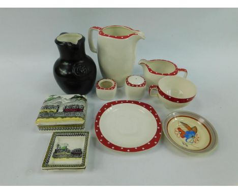 A Courage ale black glazed jug, Midwinter red domino cream and water jugs, ten cups and saucers, salt and mustard pot, Gray's