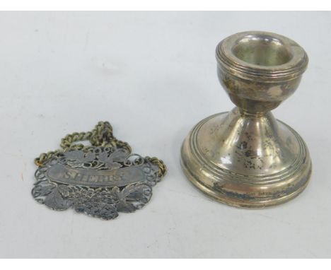 A George IV silver sherry label, with pierced and engraved line decoration, Joseph Willmore, Birmingham 1825, and a loaded si