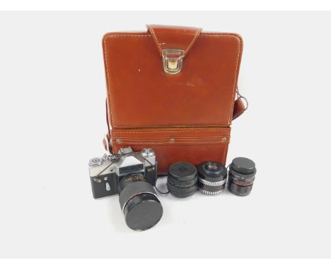 A USSR camera, with Zenit, and Carl Zeiss lenses, no.74041089, cased. 