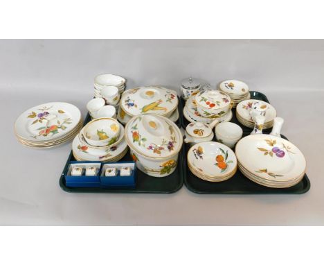 A group of Royal Worcester oven to table wares, decorated in the Evesham pattern, including tureens, flan dish, souffle dishe